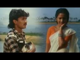 Naan Erikkarai Melirunthu Song Lyrics