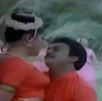Vizhiyil Pudhu Kavithai Lyrics — Theertha Karaiyinile