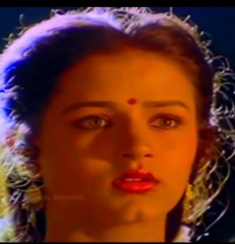Manikuyil Isaikkuthadi Female Song Lyrics
