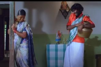 Manikkuyilu Satham Song Lyrics