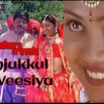 En Nenjukkul Veesiya Poongatru Song